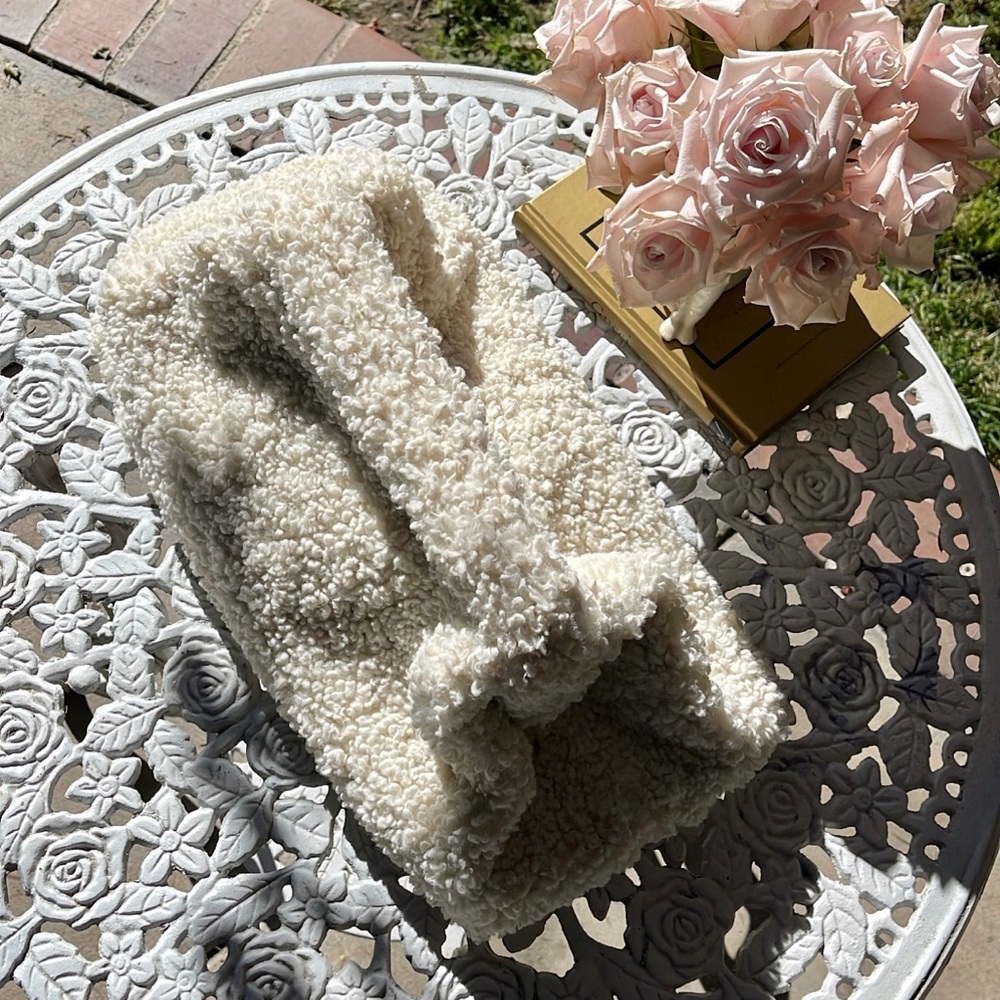 Stunning faux shearling Spring bag, fits any size phone, very soft and supple.
